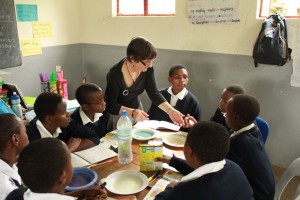 Palms Australia volunteer with students in Tanzania